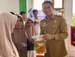 Bupati Konsel Resmi Launching Bantuan Pangan Pusat Tahun 2025 di Landono
