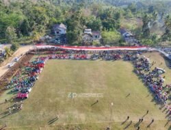 Bendera Merah Putih Berkibar 81 Meter di Porseni Kecamatan Buke